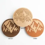 Close-up of wood inlay detail and mountain landscape on Foxwood Gifts coaster