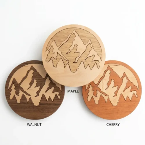 Close-up of wood inlay detail and mountain landscape on Foxwood Gifts coaster