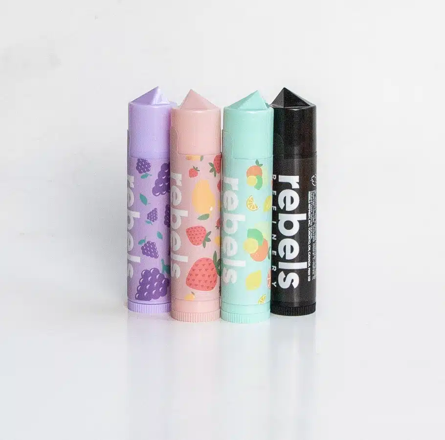 Rebels Refinery Stick Lip Balm tubes in various scents