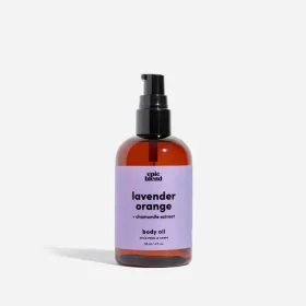 Fast absorbing all natural body oil being applied to skin