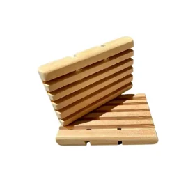 Handcrafted zero-waste wooden soap holder showing deep drainage slots