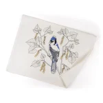 Unfolded Porchlight Press Blue Jay tea towel showing the detailed blue bird and oak leaf illustration