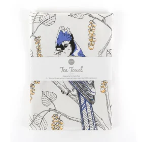 Absorbent blue jay flour sack cotton kitchen towel hanging neatly on a rustic wooden rack