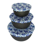 Colibri reusable fabric bowl cover set fitted over three different sized bowls in a kitchen