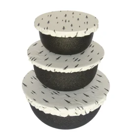 Colibri reusable fabric bowl cover set fitted over three different sized bowls in a kitchen