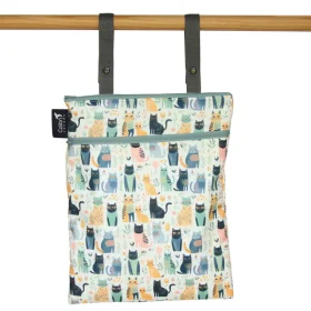 Colibri reusable fabric double duty wet bag zipped shut showing the hanging snap straps