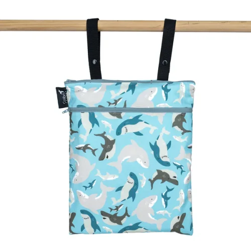 Colibri reusable fabric double duty wet bag zipped shut showing the hanging snap straps