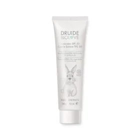 Tube de crème solaire pour bébé Druide FPS30 posé sur un fond blanc uni