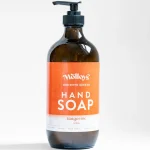 Molloy's 500ml tangerine hand soap in a reusable glass dispenser