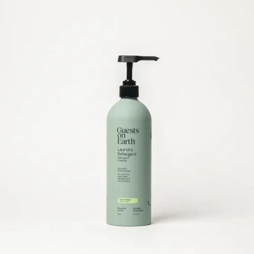 Guests on Earth Green Hinoki laundry detergent aluminum bottle