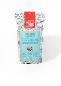Klondike Kettle Corn Hiker's Delight Popcorn bag standing on a plain white background