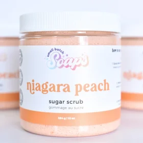 Small Batch Soaps Niagara Peach Sugar Scrub jar standing on a plain white background