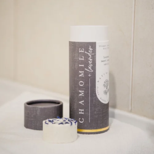 Natura Soylights Shower Steamer Tube Lavender Chamomile on bathroom counter