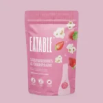 Strawberries & Champagne popcorn by EATABLE, white chocolate kettle corn with popping crystals and freeze-dried strawberries, 125 g bag, made in Canada