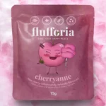Sachet de barbe à papa Flufforia Cherryanne saveur cerise acidulée 15 g avec barbe à papa cerise rouge